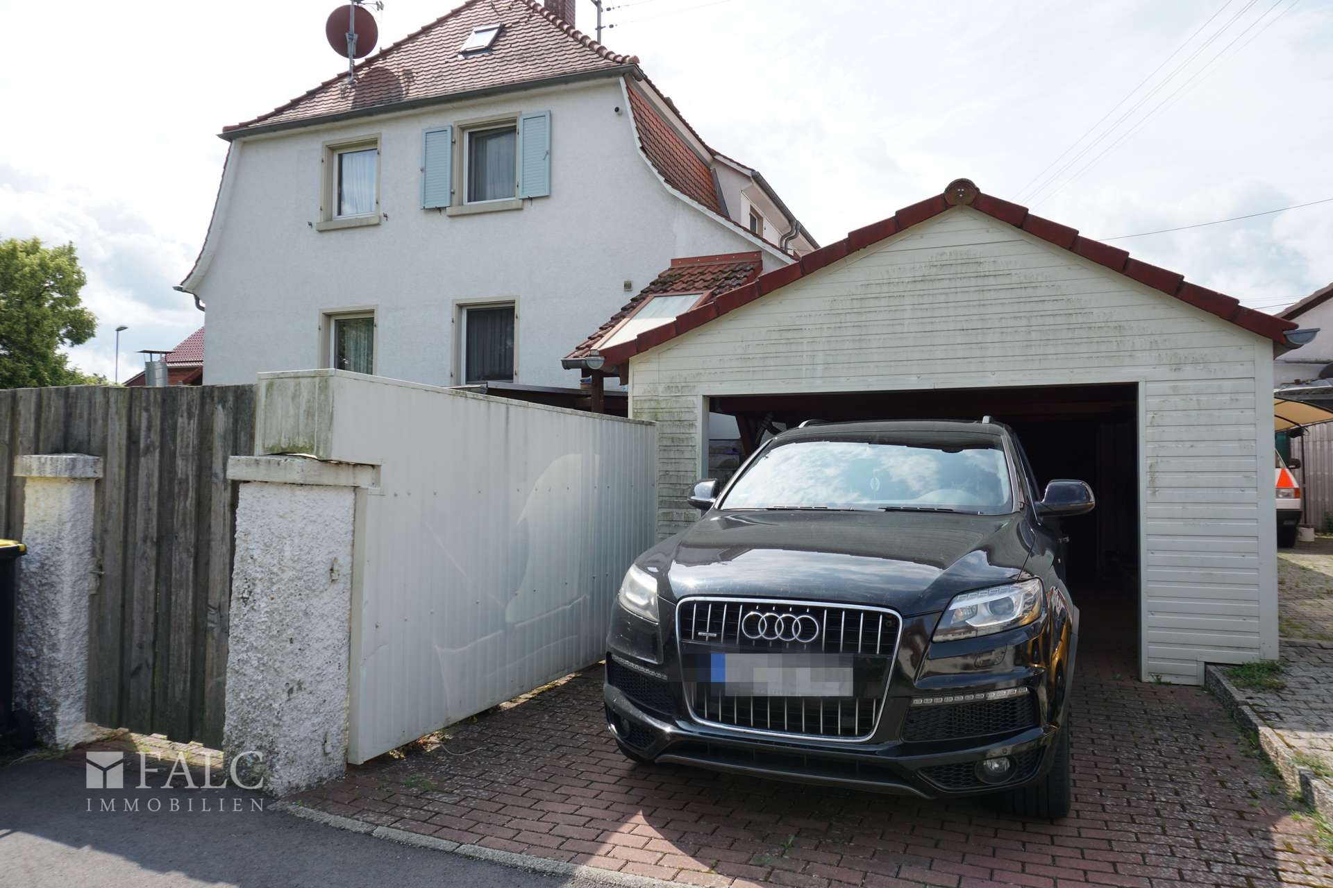 Garage mit Carport
