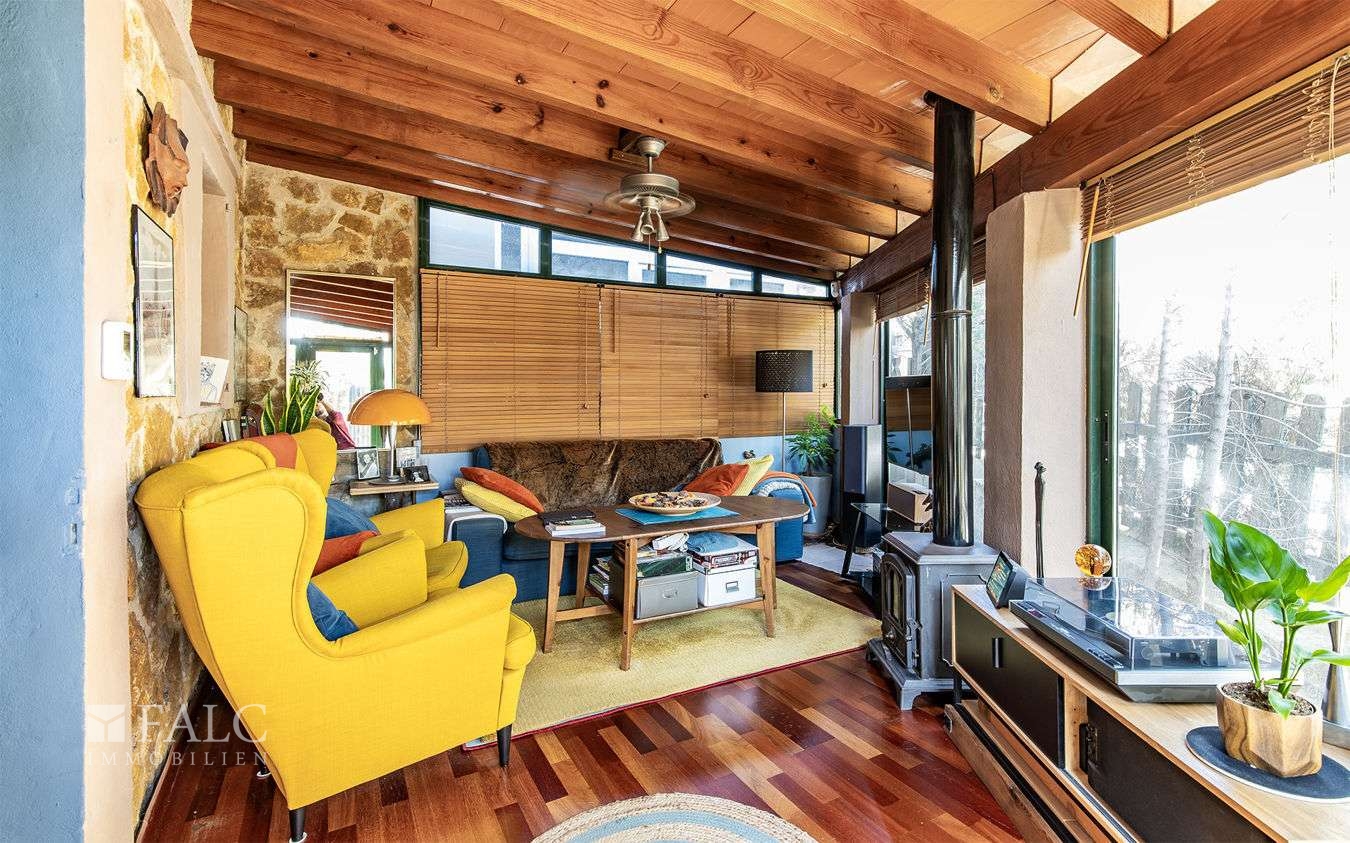 Wintergarten mit Kamin