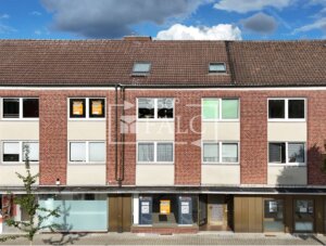 Vielseitige Gewerbeeinheit mit Wohnmöglichkeit & zwei Garagenstellplätzen