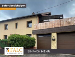 Einfamilienhaus in zentraler Lage mit 2 Garagen