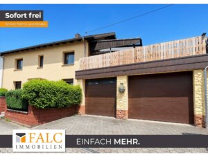 Einfamilienhaus in zentraler Lage mit 2 Garagen